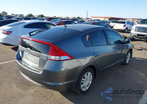 2011 Honda Insight Lx z USA, uszkodzony, nr VIN JHMZE2H5XBS007922